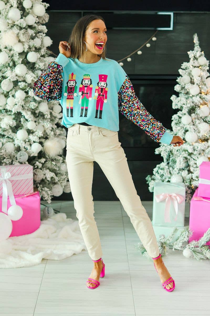 Nutcrackers on Blue Top with Sequin Sleeves