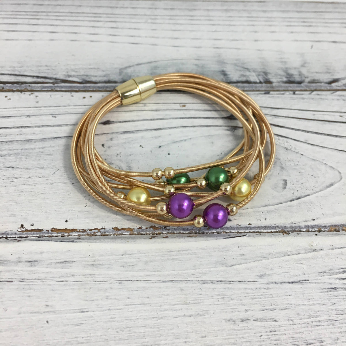 Mardi Gras pearl guitar string bracelet 